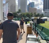 Event logistics team carrying equipment for Redbull concert in Miami, Florida